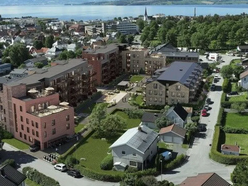 Ankerløkka Park på Hamar vil bestå av 132 leiligheter fordelt på tre blokker. Håpet er å starte byggearbeidene sommeren 2025.. Illustrasjon: Locka
