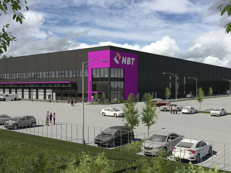 Norsk Bibliotektransport AS blir leietaker for det nye næringsbygget på Lahaugmoen i Lillestrøm kommune.. Illustrasjon: Veidekke Logistikkbygg.