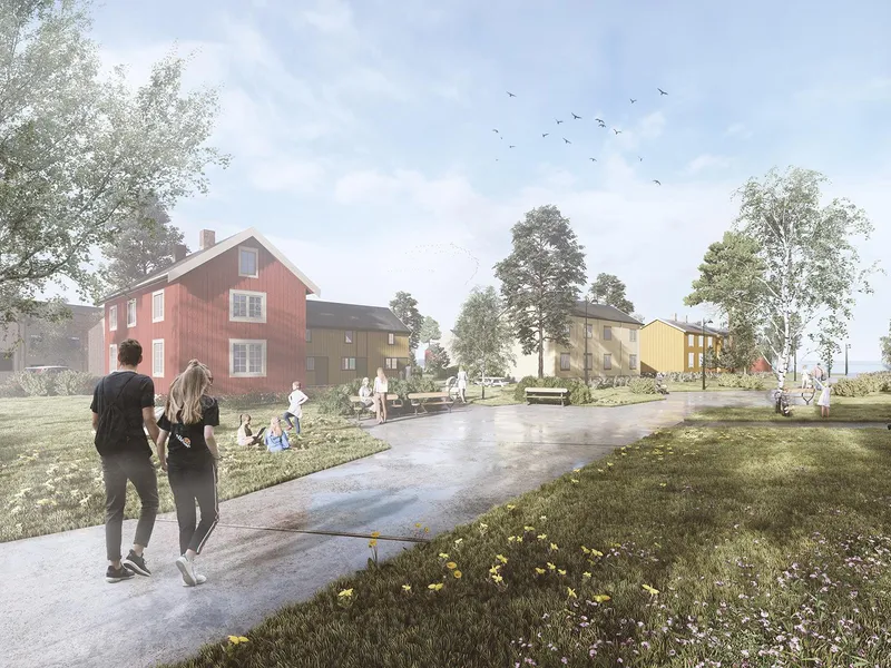 Personer går på rolig vei mot kulturhistorisk bomiljø