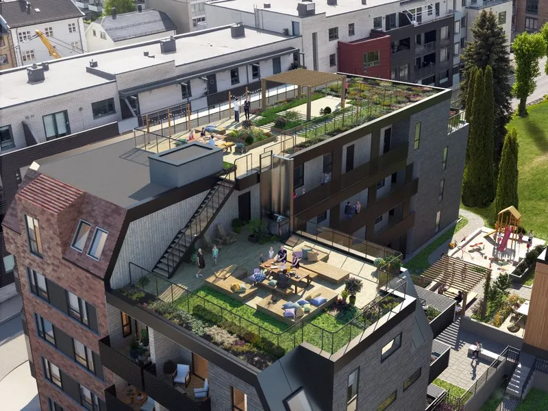 Boligene får flotte takterrasser med utsikt mot Kirkegårdsparken i Drammen sentrum.