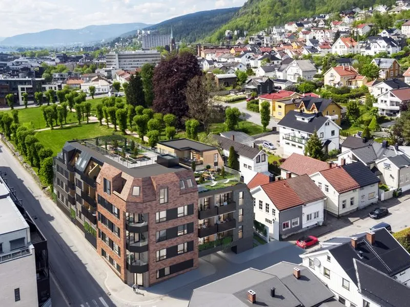 Engene Hage er et nytt boligprosjekt, solrikt og sentralt beliggende i Drammen, rett ved Bragernes torg. Her kommer 30 flotte selveide leiligheter og 3 townhouse. Illustrasjon: Peab.