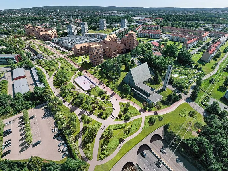 Slik kan et miljølokk over E6 på Manglerud bli. Illustrasjonen viser også eksempler på hvordan tomter langs motorveien kan brukes til boligbygging.