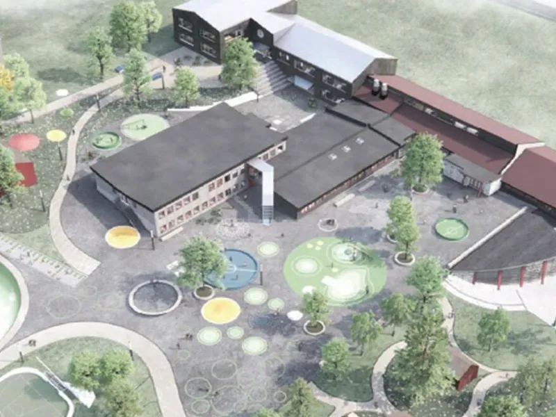 Skolebygg sett fra luften. Illustrasjon. 