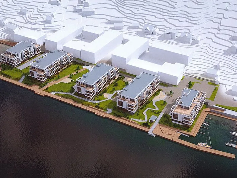 Blokk 4 og 5 (til venstre i bildet) består av 42 leiligheter med flott beliggenhet ved vannkanten. Illustrasjon: Spir arkitekter