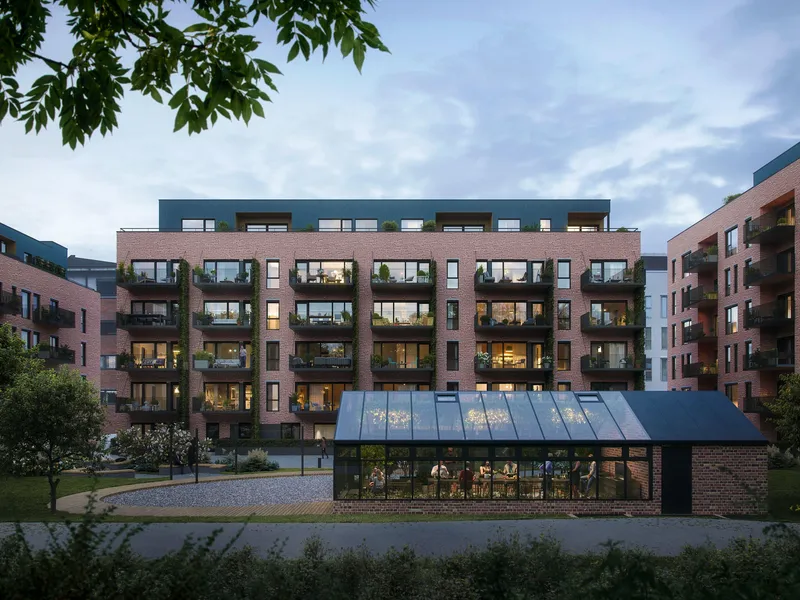 Blokker omkranser et fint torg med et drivhus.