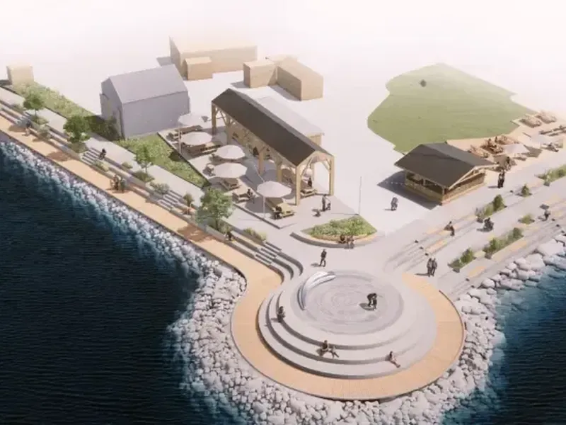 Solplassen, en sirkelformet møteplass med nedtrappinger til vannet, bygges der dagens molo ligger.  Illustrasjon: C. F. Møller Architects