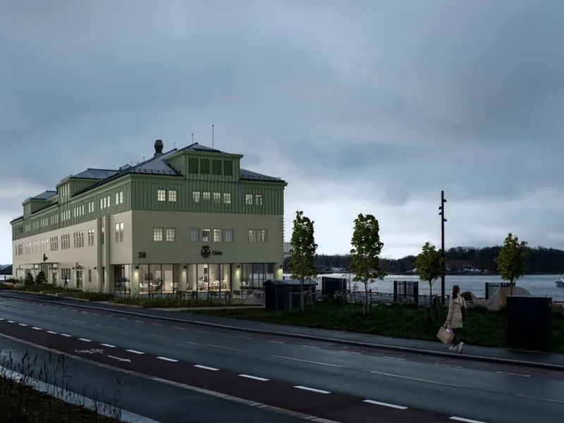 Historisk bygg. Havnas hovedkontor var tidligere lagerbygg for Den Norske Amerikalinjen. Ombyggingen skal gi tidsriktige og miljøvennlige løsninger, og samtidig spille på byggets historiske karakter.  Utenfor ligger Gastenparken med planter, lekeapparater og benker,. Området  rundt skur 38 skal oppgraderes ytterligere. Illustrasjon: Spir Arkitekter
