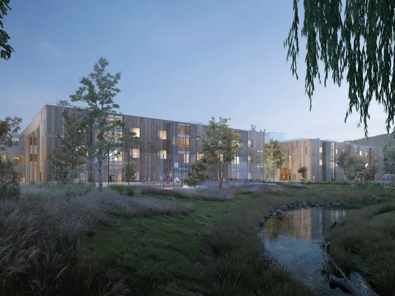 Utsikt fra Nøstebekken mot psykiatribyggene til nytt sykehus i Drammen. Illustrasjon: Helse Sør-Øst RHF, Link arkitektur, Ratio arkitekter, Bølgeblikk.