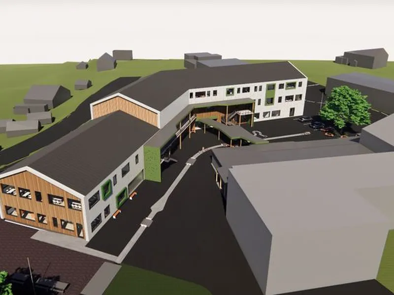 Bygningen blir plassert nordøst på skolens område, der det nå er parkering. Plasseringen gir en lun og skjermet skolegård. Illustrasjon: Sporstøl Arkitekter