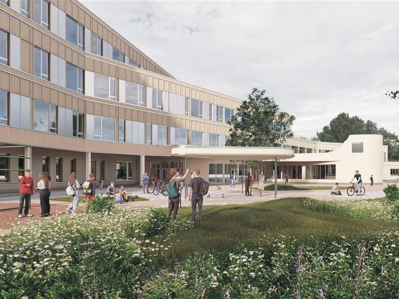 Illustrasjon som viser hvordan skolen og flerbrukshallen i Hunndalen kan bli.  - Klikk for stort bilde