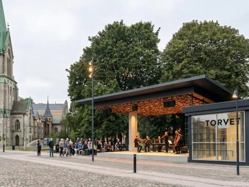 Illustrasjon av Paviljongen slik den skal se ut når taket er ferdig bygd, med Domkirken i bakgrunnen.