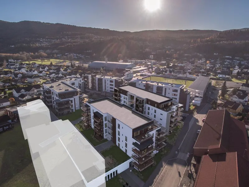 Det er 25 nye leiligheter med en prisantydning på mellom 3,2 og 7,7 millioner som nå skal bygges ut i Stadionkvartalet i Mjøndalen. Illustrasjon: Diakrit