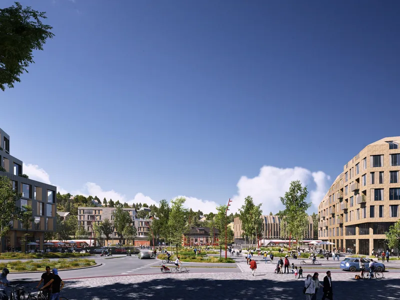 Illustrasjon av åpen plass med nye bygg rundt og en togstasjon bak
